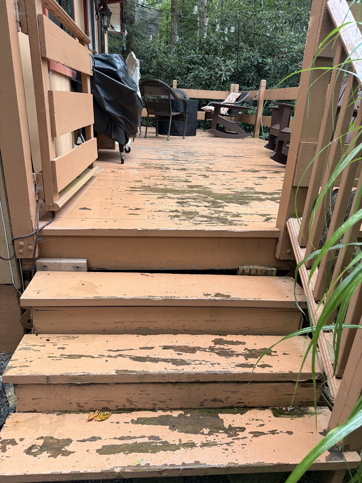 Peeling deck steps before restoration