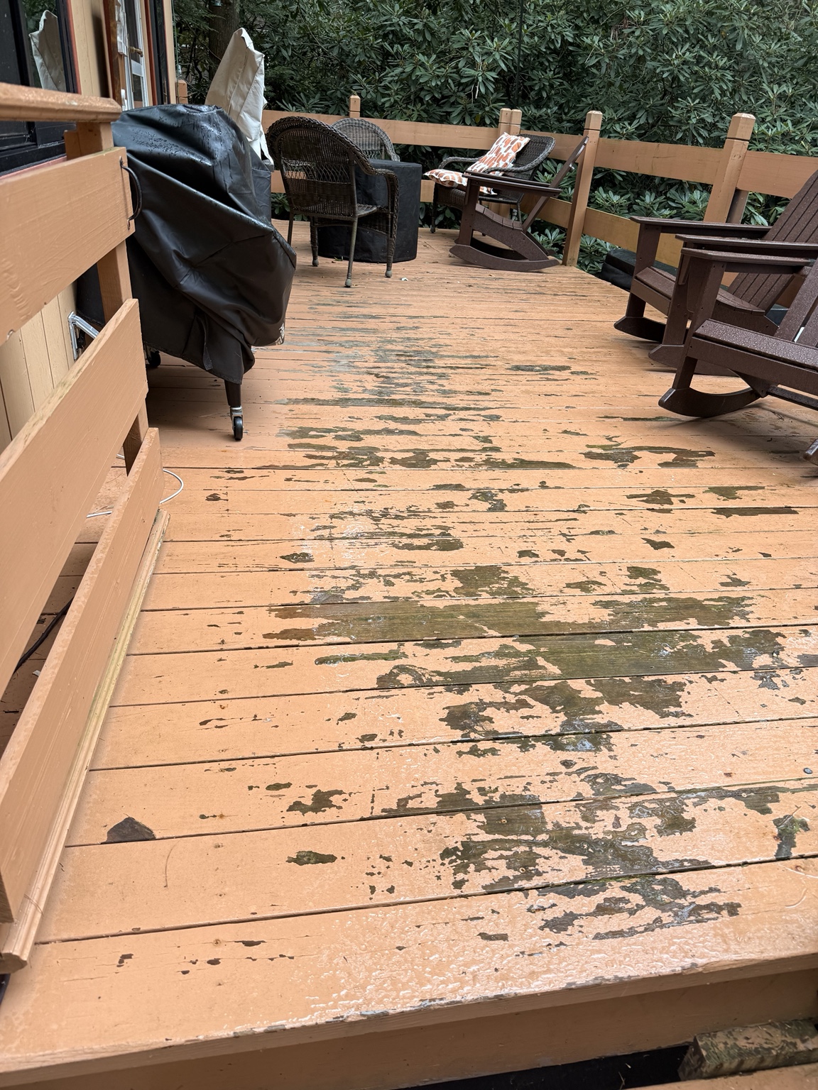 Worn deck boards with extensive failing finish before refinishing