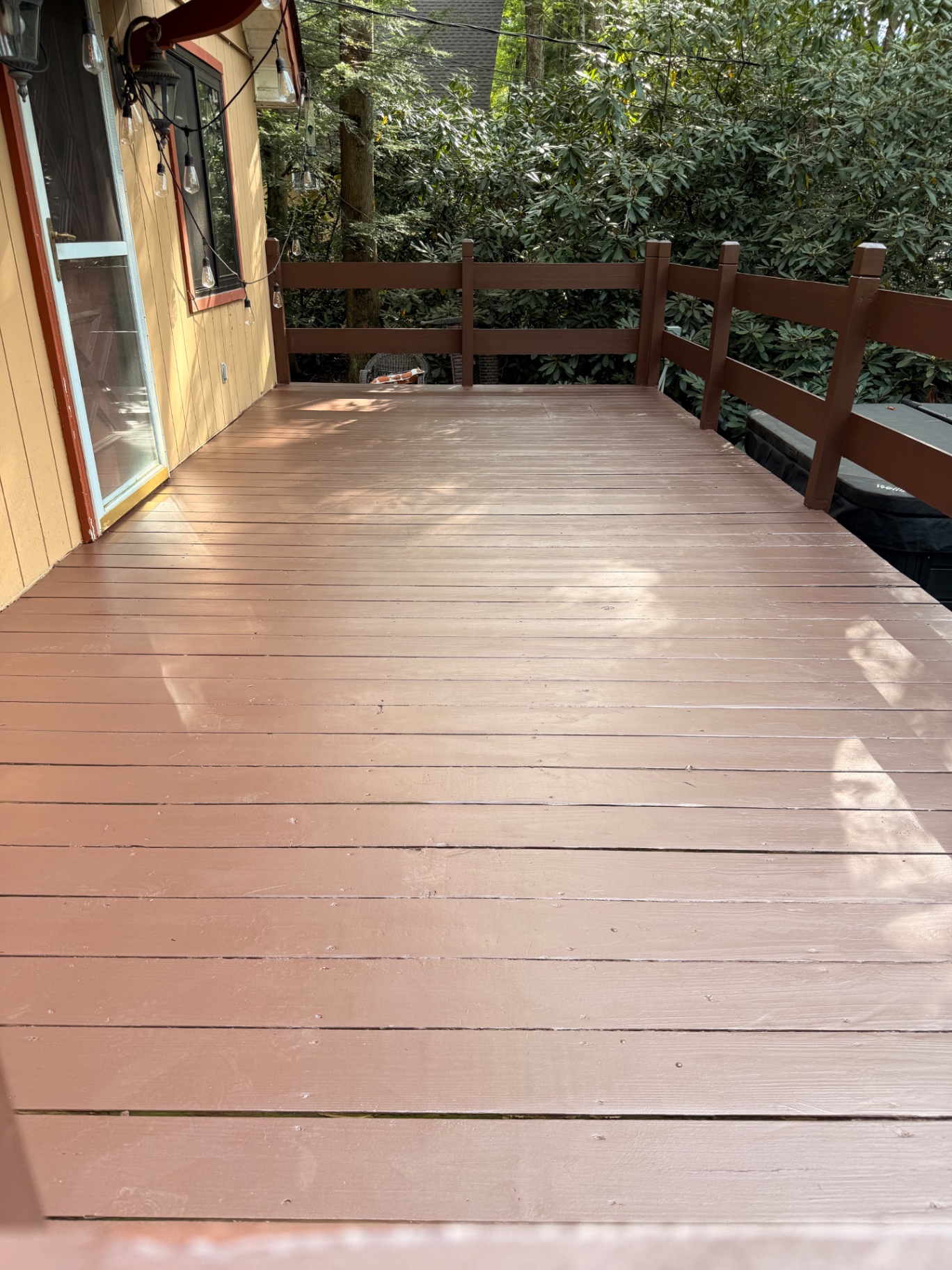 Refinished deck boards with a clean uniform protective coating