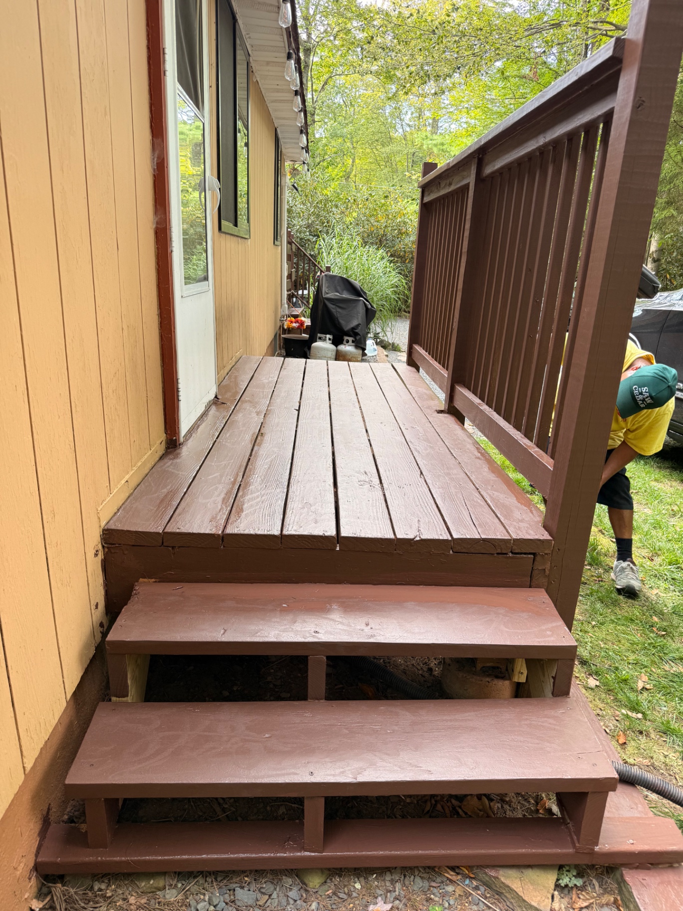 Completed rear deck stairs and refinished walking surface